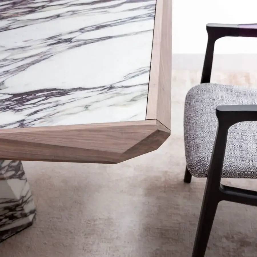 Exceptional Giorgetti Amadeus table crafted in Canaletto walnut with polished marble insert and satin finish