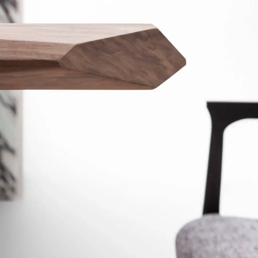 Luxury Giorgetti Amadeus table crafted in Canaletto walnut with satin finish and striking marble inserts