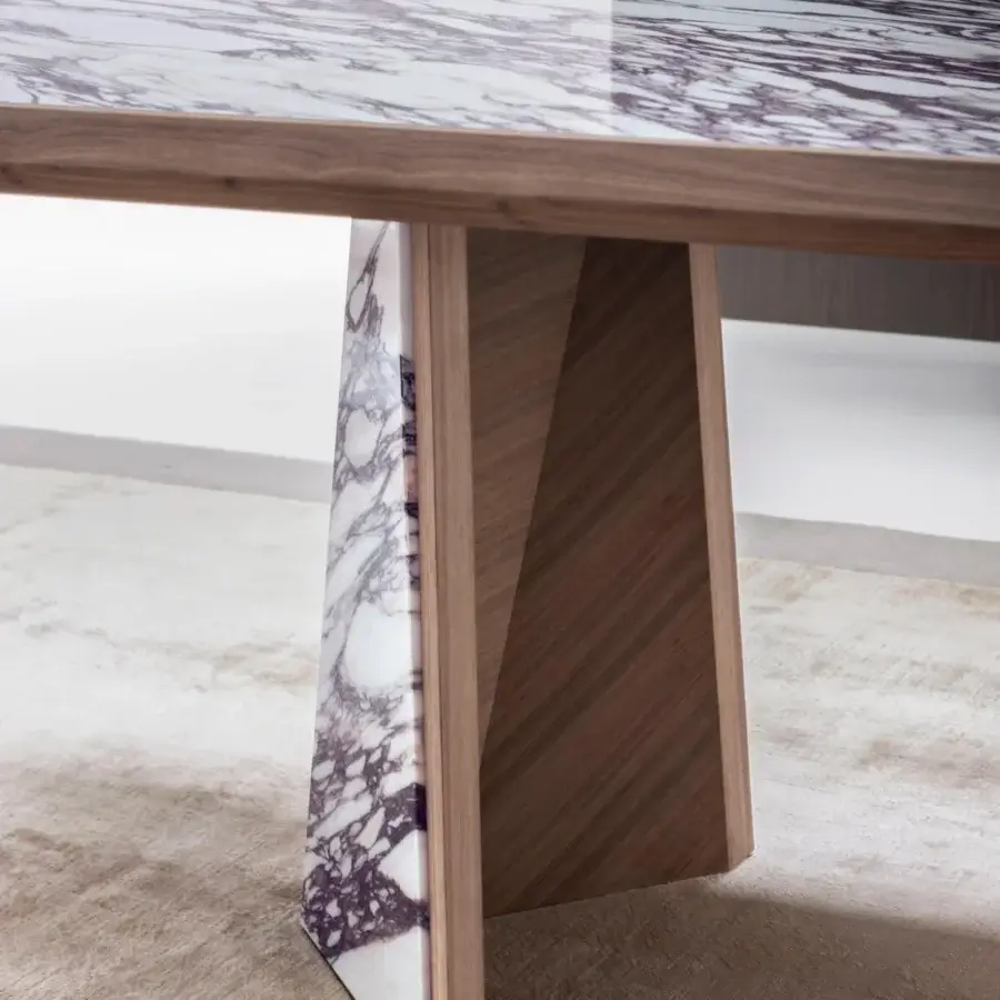 Exceptional Giorgetti Amadeus table crafted in Canaletto walnut with a marble insert and angled legs