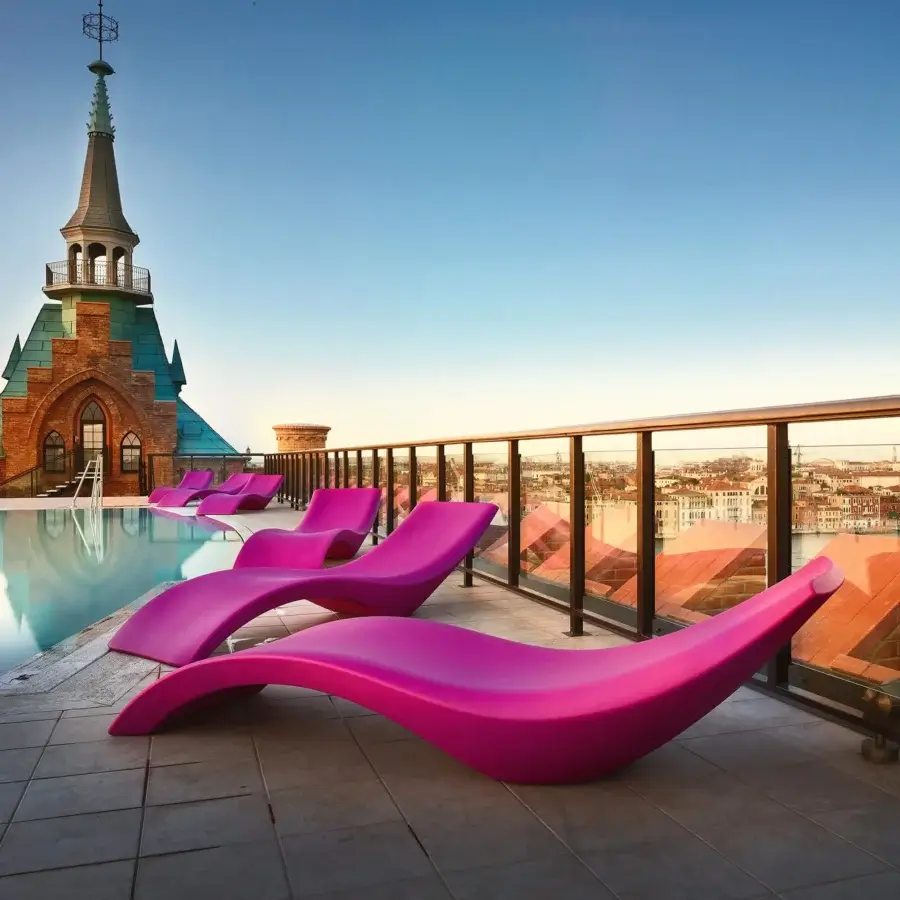 Exceptional MY YOUR Cloe lounger with organically curved form crafted in pink Poleasy® material and glossy finish