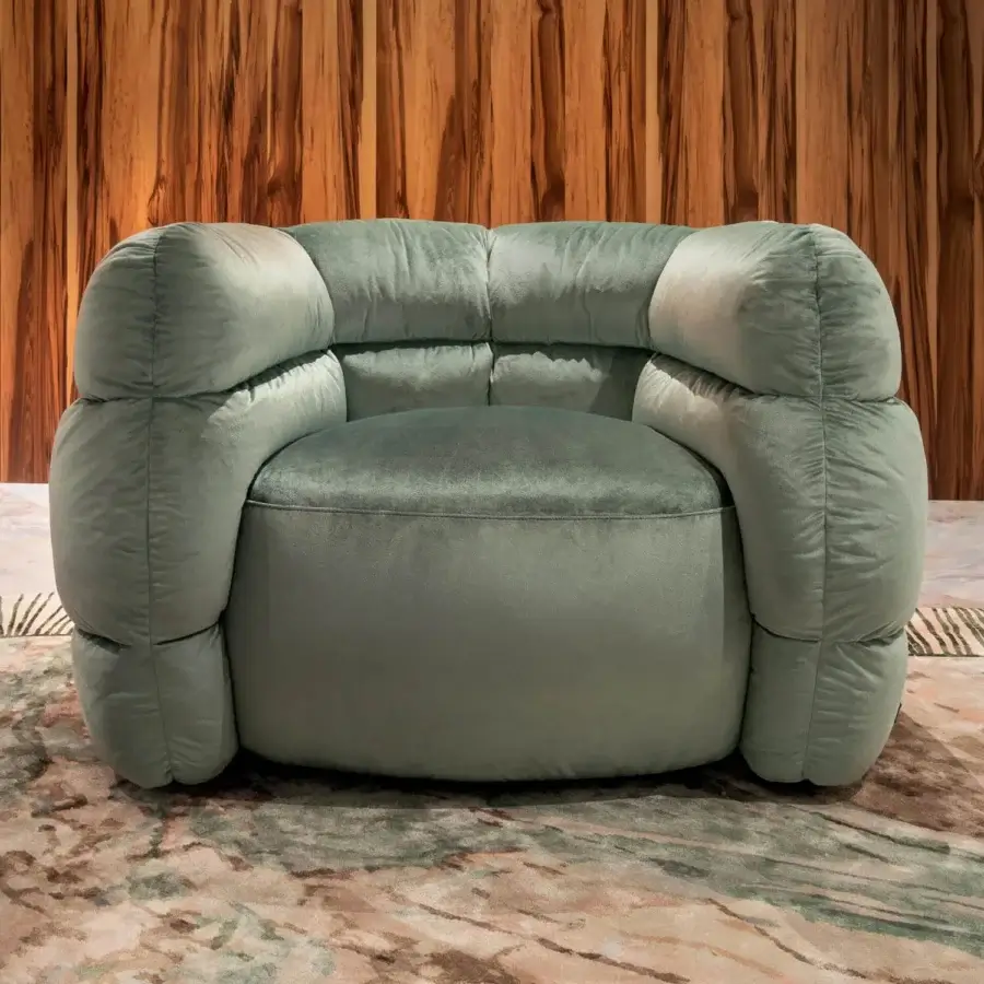 Distinguished Visionnaire Bomber lounge chair upholstered in lavish sage green textile with multilayer wood frame