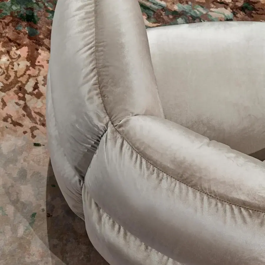 Distinguished Visionnaire Bomber lounge chair upholstered in lavish pale beige textile with a satin finish
