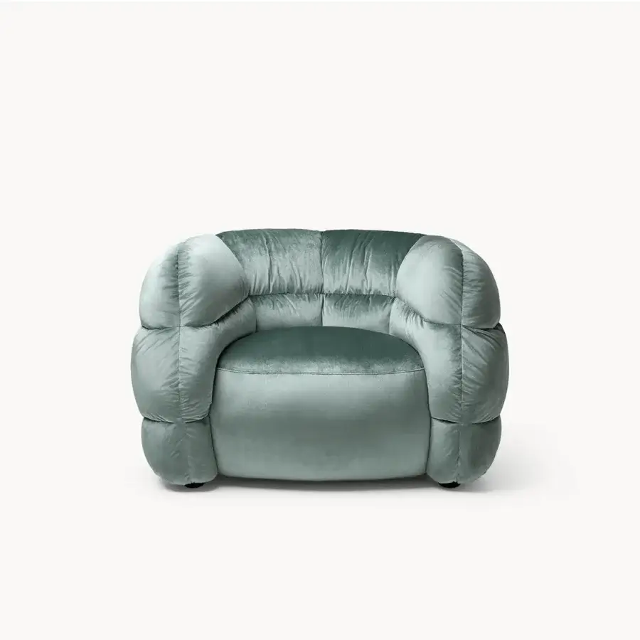 Lavish Visionnaire Bomber lounge chair upholstered in plush dusty teal textile with resilient elastic webbing suspension