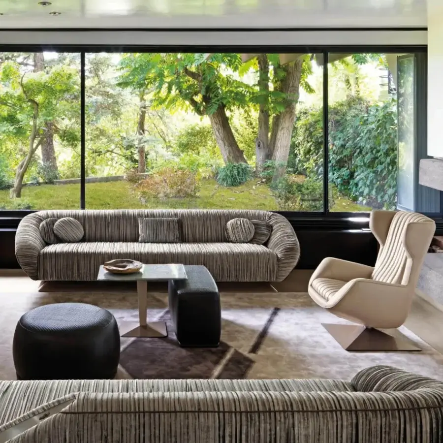 Lavish Visionnaire Citizen sofa built with wood, upholstered in textured beige and gray textile with resilient suspension and plush goose down quilt