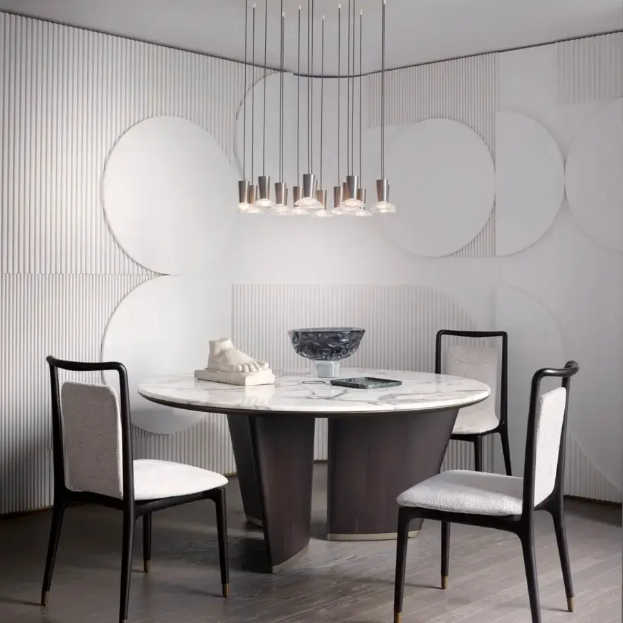 Lavish Giorgetti Mistral round table with a marble top divided by a bronze insert and veneered ash wood legs