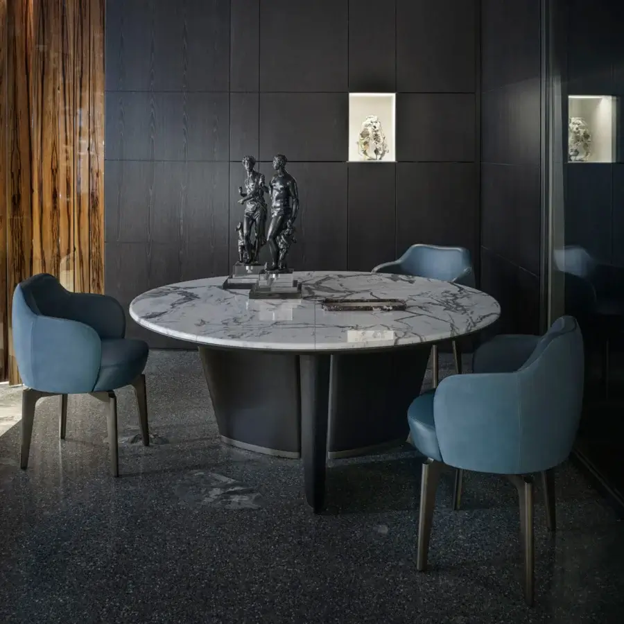 Exceptional Giorgetti Mistral round table with a white marble top, bronze insert, and veneered ash wood legs crafted in Italy