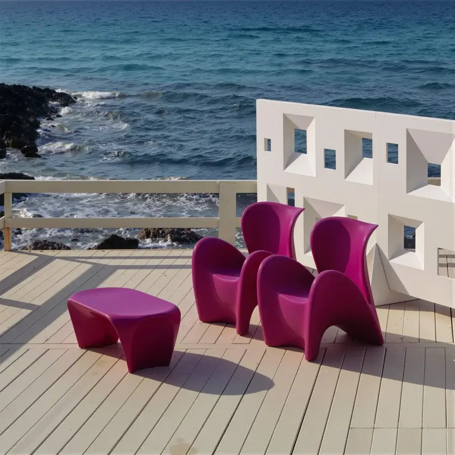 Exceptional MY YOUR Lily lounge chair crafted in magenta synthetic material with glossy finish