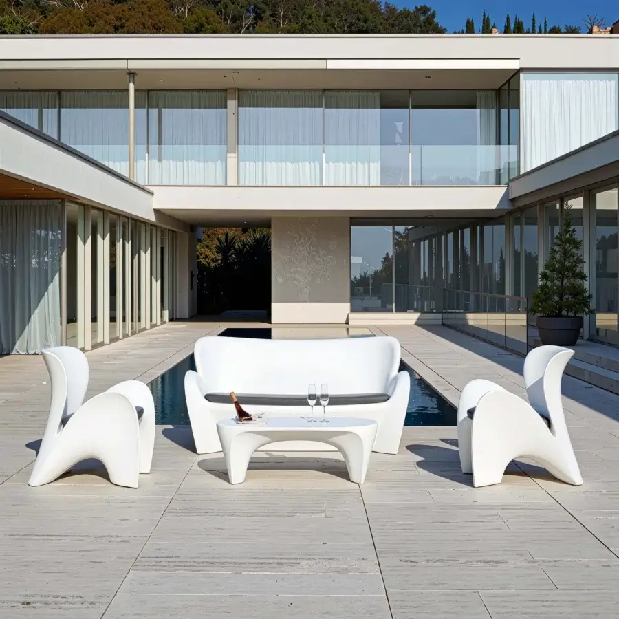 Distinguished MY YOUR Lily lounge chair with organic form sculpted in matte plastic offering strong support and poetic beauty