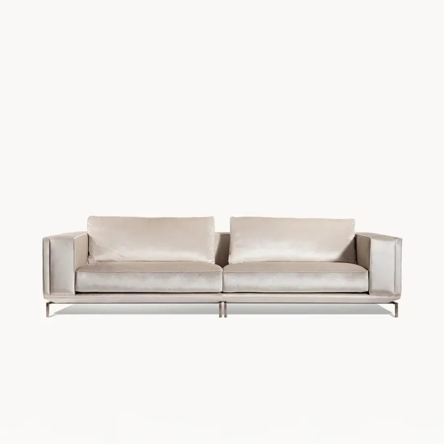 Lavish Visionnaire Denzel sofa upholstered in warm beige velvet with satin finish and sleek satin stainless steel base
