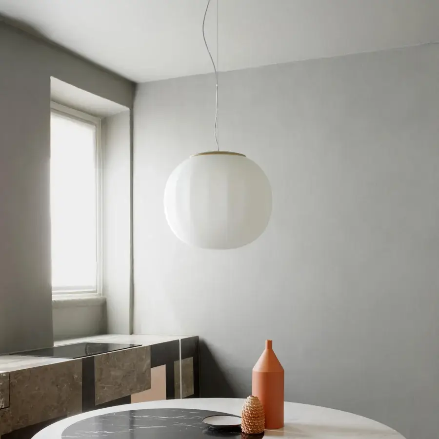 Distinguished Luceplan Lita suspension lamp with opaline blown-glass and brass structure exhibiting a smooth frosted white finish