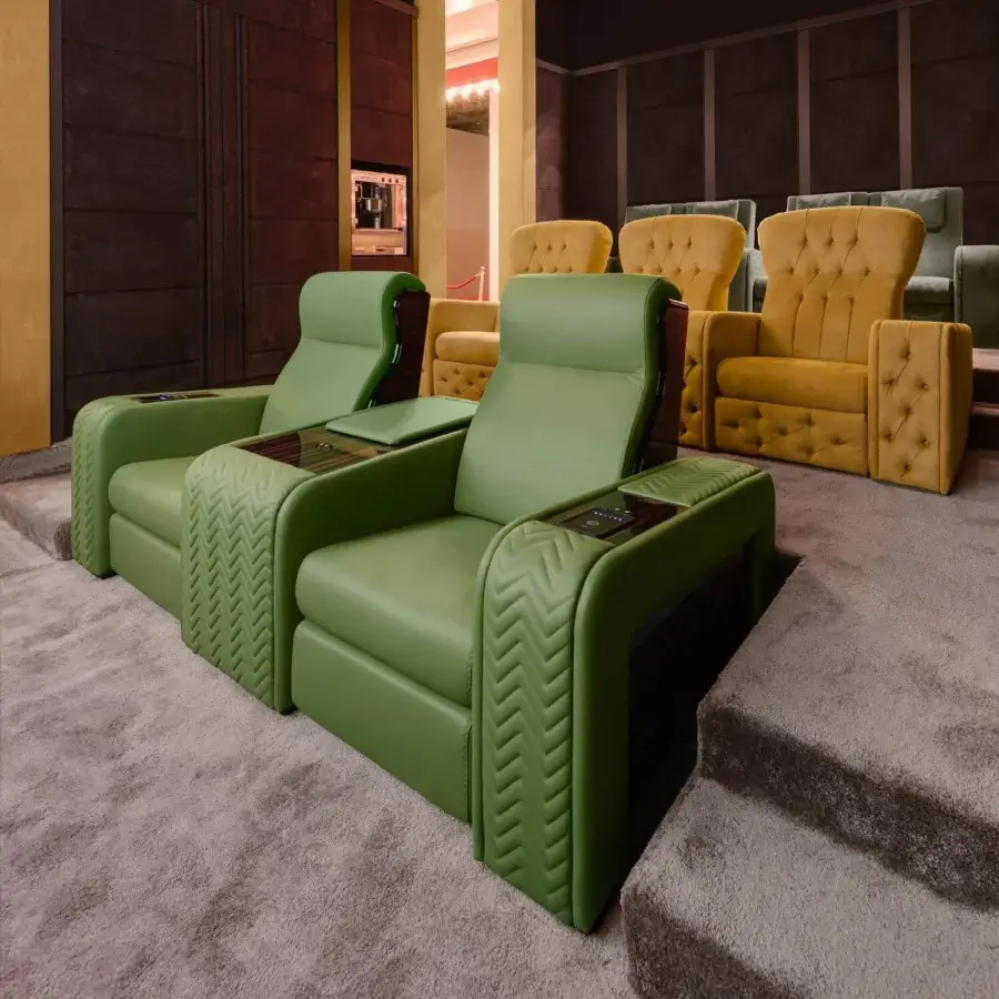 Distinctive Vismara Onassis home cinema seating in vibrant green leather with zigzag quilting and polished Ebony Makassar wood accents