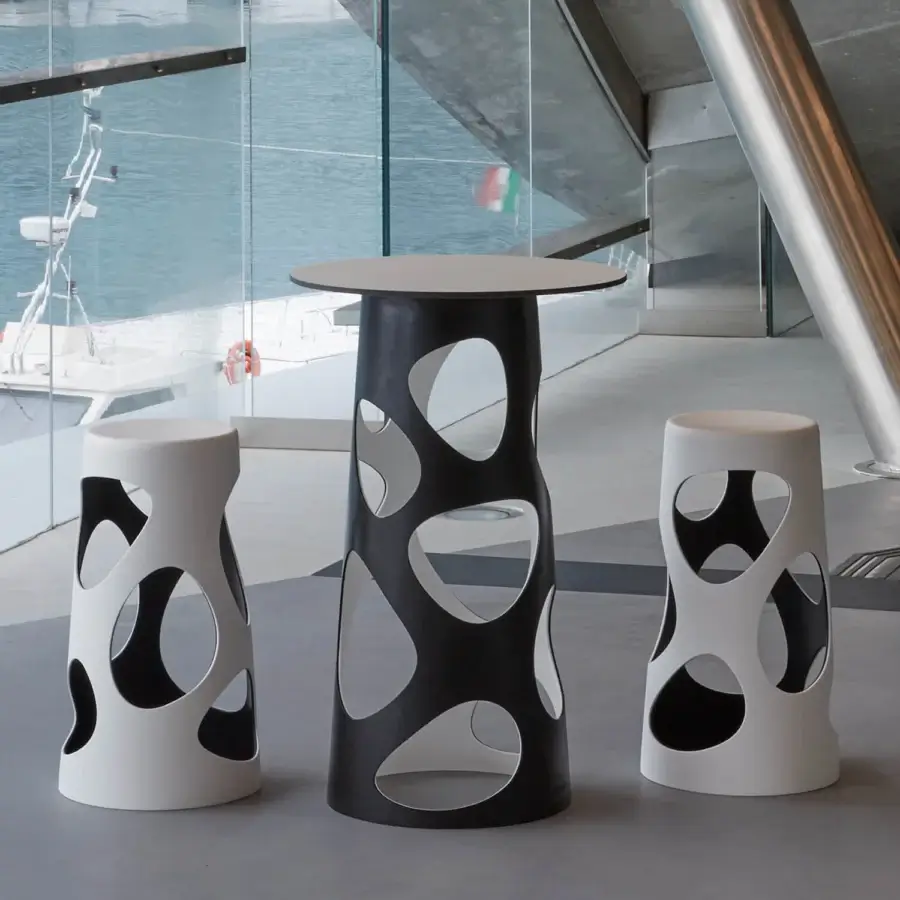 Superior MY YOUR Liberty bistrot table with black exterior and white organically-shaped cut-outs crafted in Italy with a smooth finish