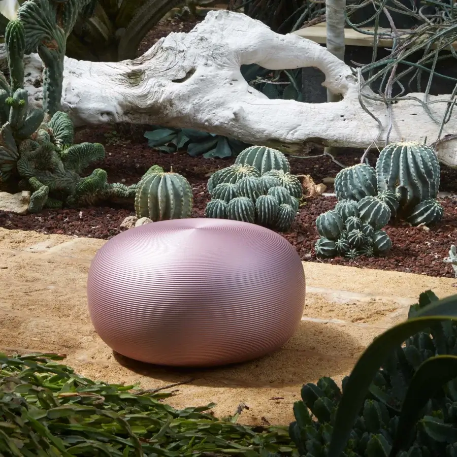 Distinguished MY YOUR Pandora stool with softly rounded blush silhouette and vertically ribbed textured synthetic material with satin finish