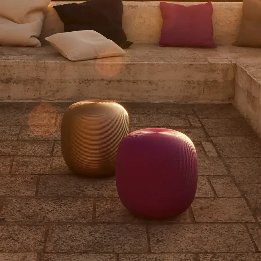 Distinguished MY YOUR Pandora stool with gently rounded form crafted in golden-bronze with subtly textured surface