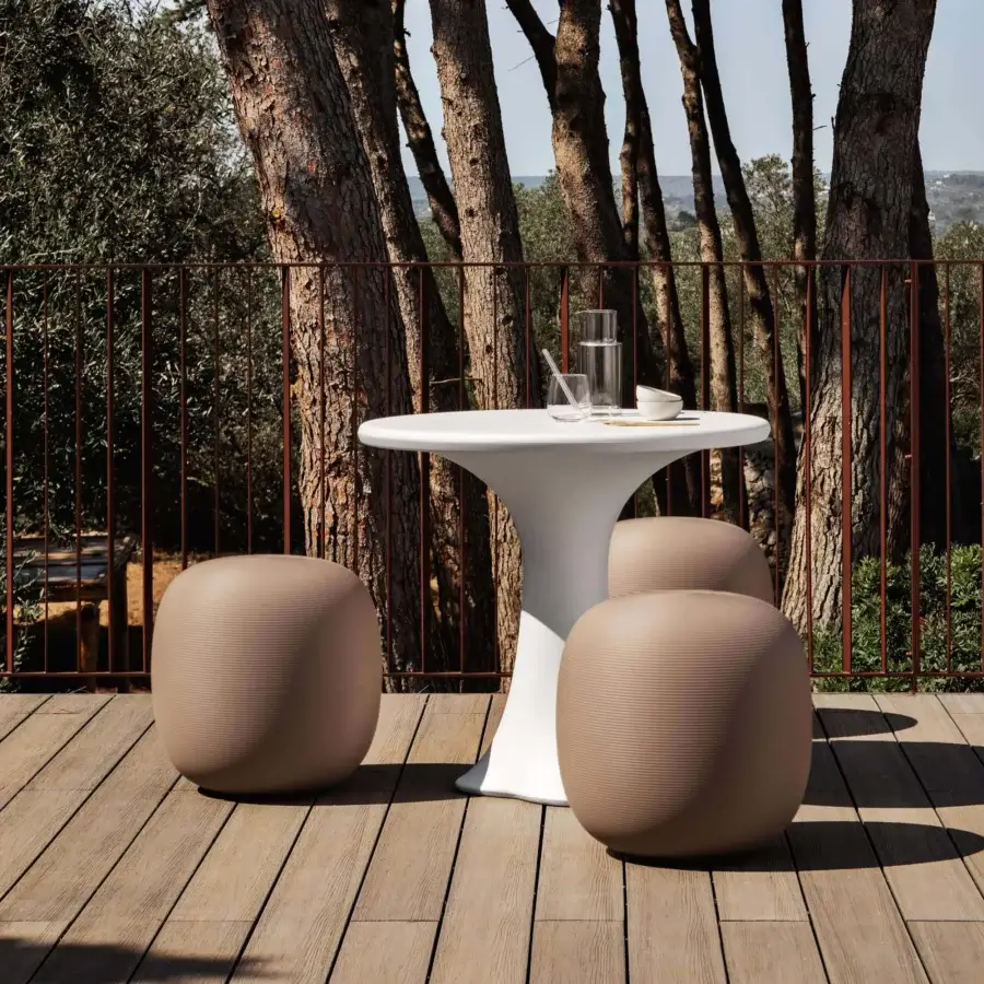 Elegant MY YOUR Pandora stool with compact rounded form crafted in earthy brown durable synthetic material with ribbed finish