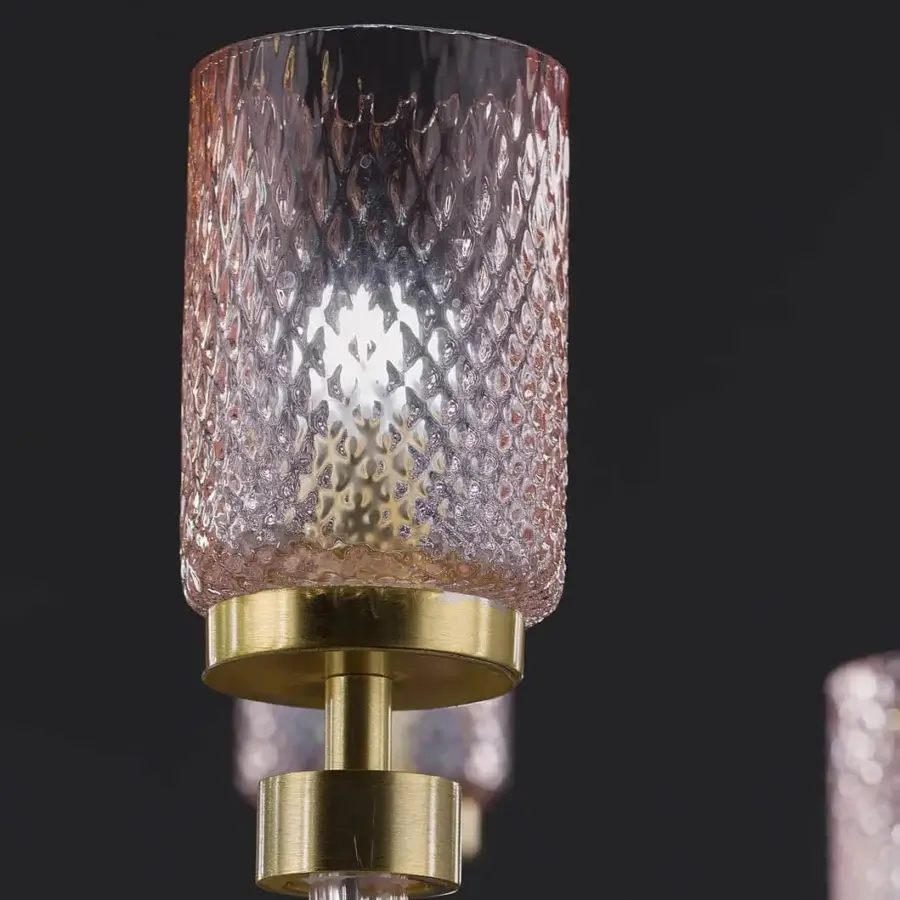 Exceptional Euroluce Dely wall lamp crafted with sculpted glass in rosaline to smoky gray and polished brass bushings