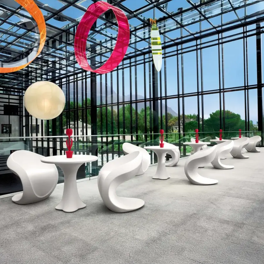 Distinguished MY YOUR Miss Petra chair with organically curved form built in durable synthetic material and smooth matte finish