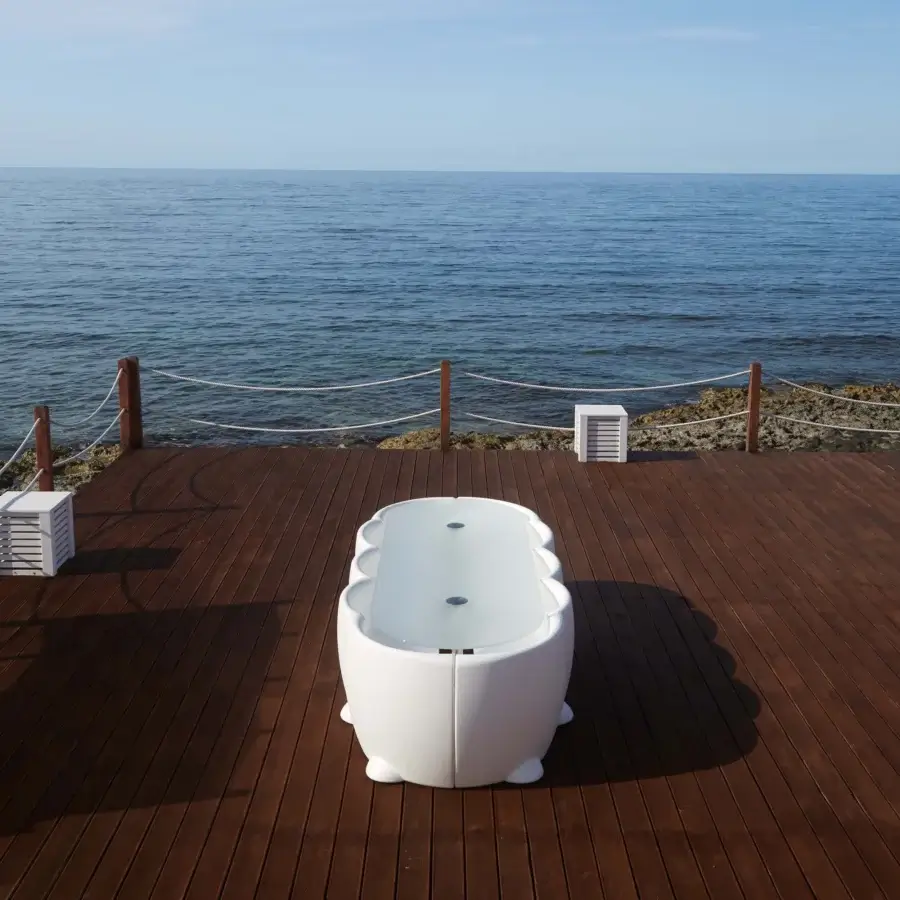 Superior MY YOUR Rhonda chair with sculpted form crafted in smooth white synthetic material for outdoor use