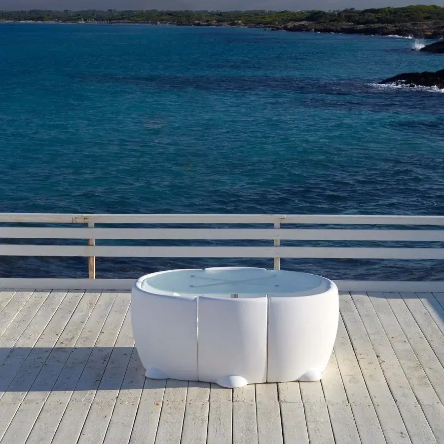 Captivating MY YOUR Rhonda chair with organic cocoon form molded in uniformly white synthetic material and smooth finish