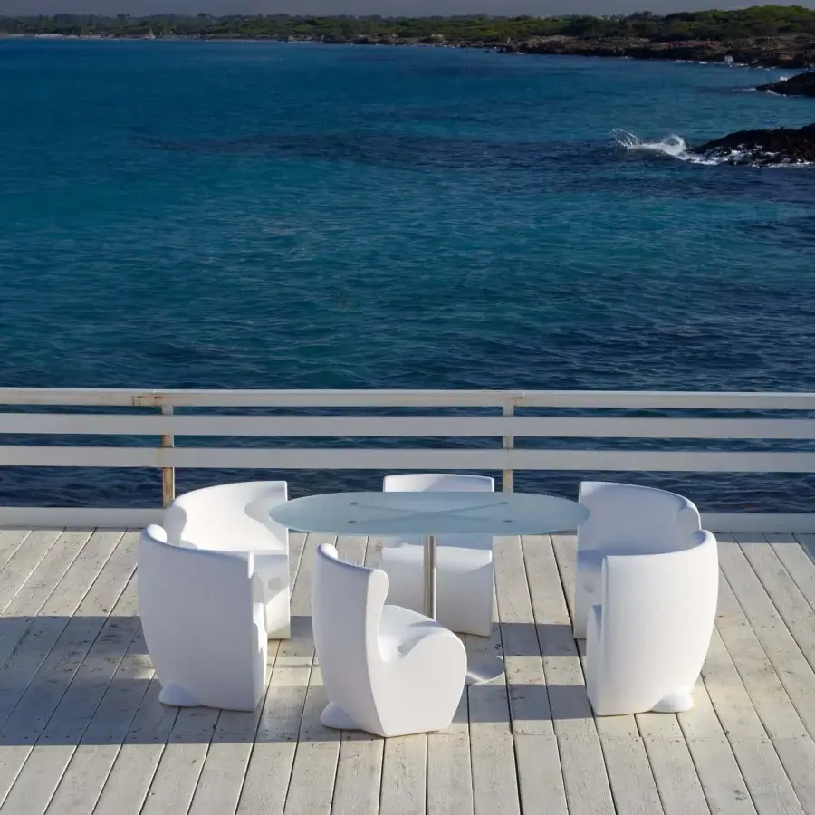 Distinguished MY YOUR Rhonda chair with organically shaped silhouette crafted in glossy white molded synthetic material