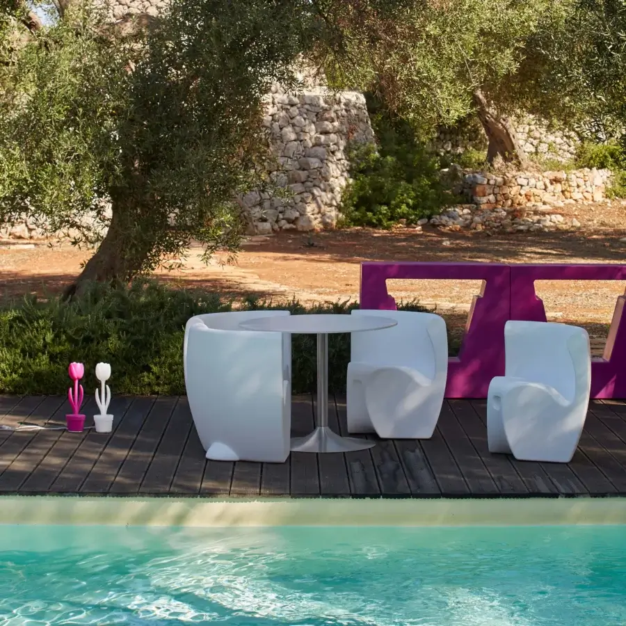 Captivating MY YOUR Rhonda chair with organically rounded form molded in durable white synthetic material and smooth matte finish