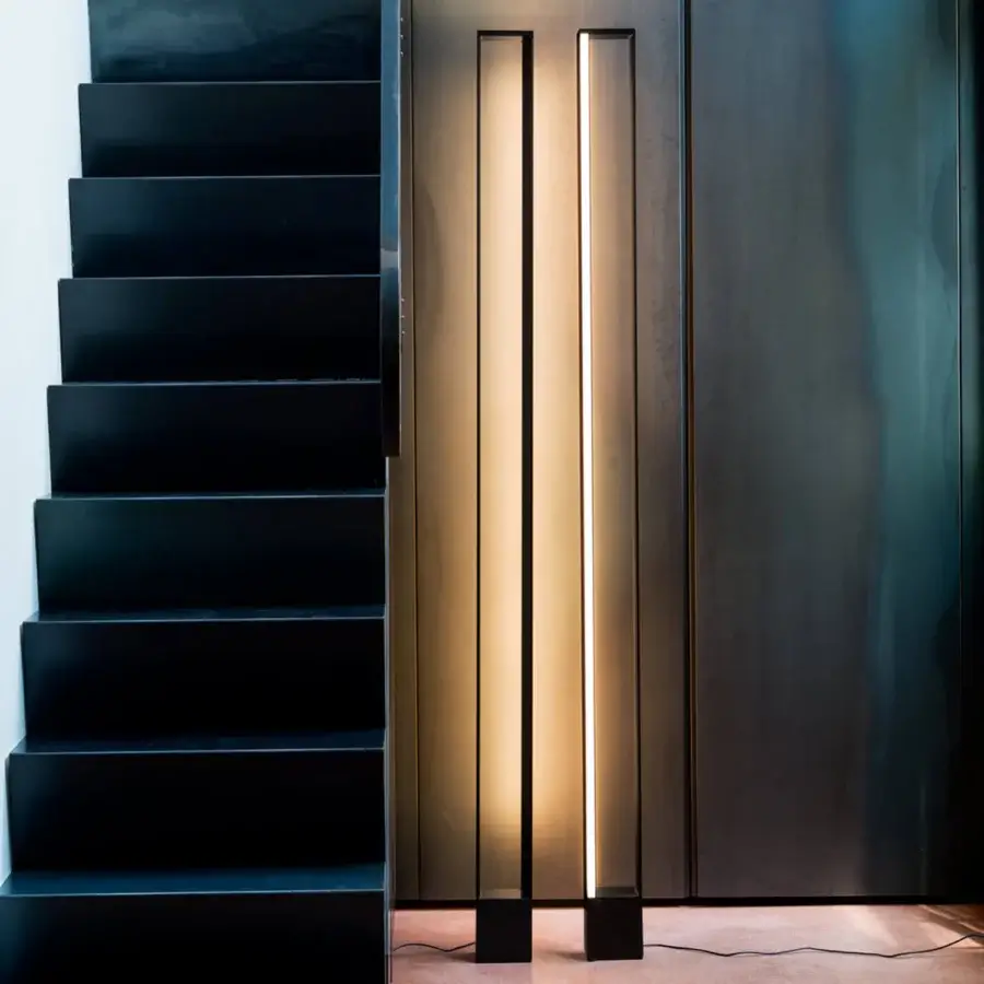Elegant Nemo Tru floor lamp with tall aluminum silhouette and dual luminous rectangular panels in matte finish