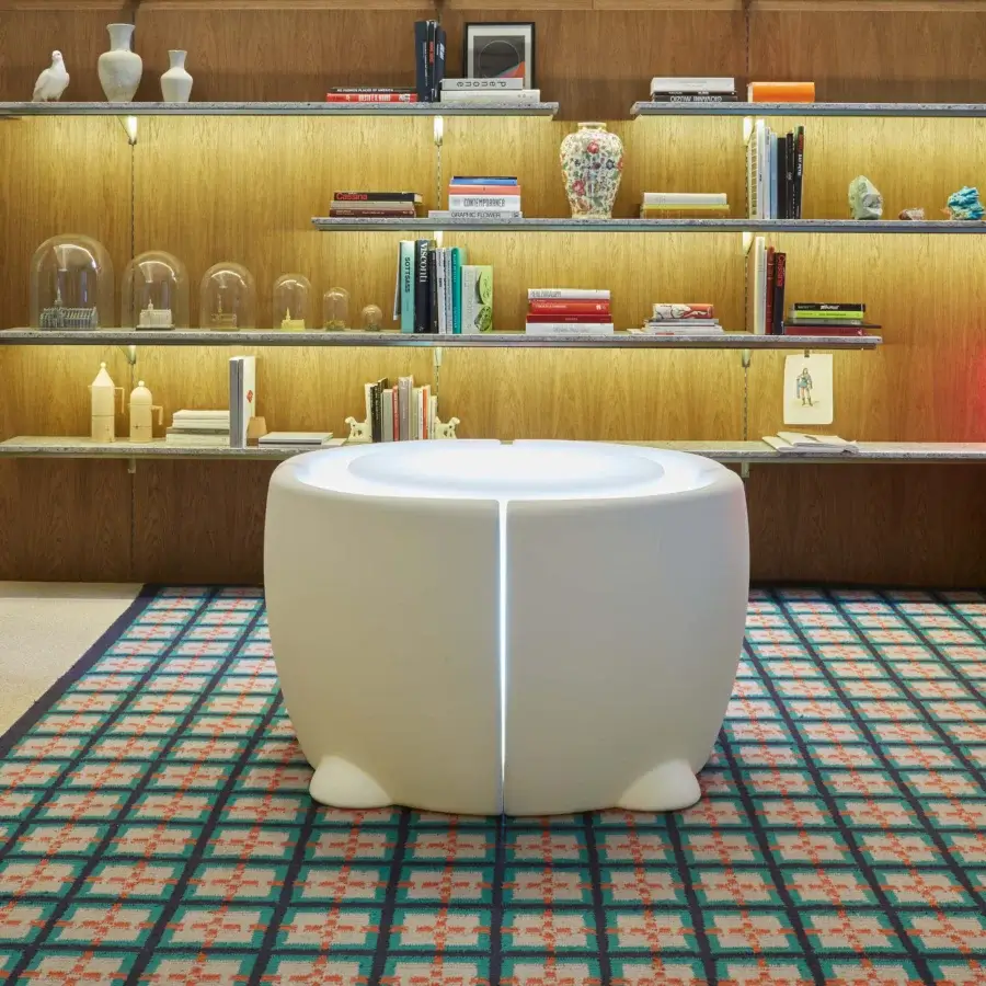 Captivating MY YOUR Teddy table crafted in pale off-white synthetic material with uniformly matte finish and organic form