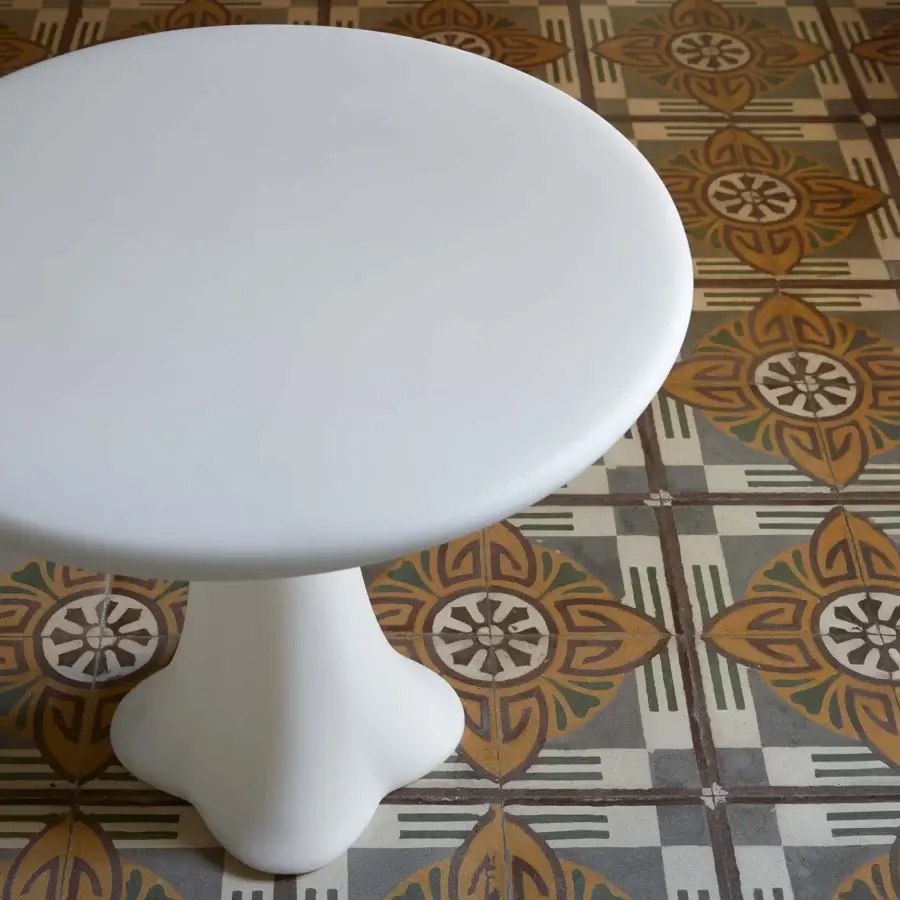 Distinguished MY YOUR Teddy table crafted in white synthetic material with a matte finish and organic silhouette