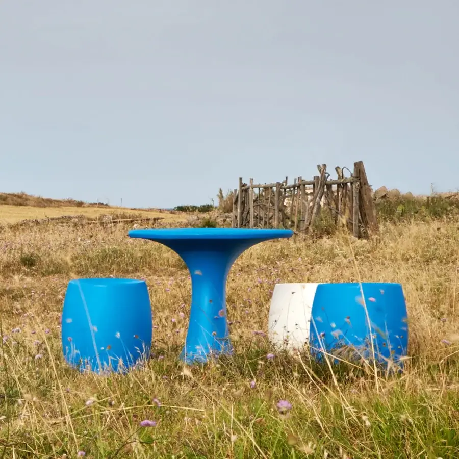 Captivating MY YOUR Teddy table crafted in vibrant blue synthetic material with a glossy finish and hourglass pedestal