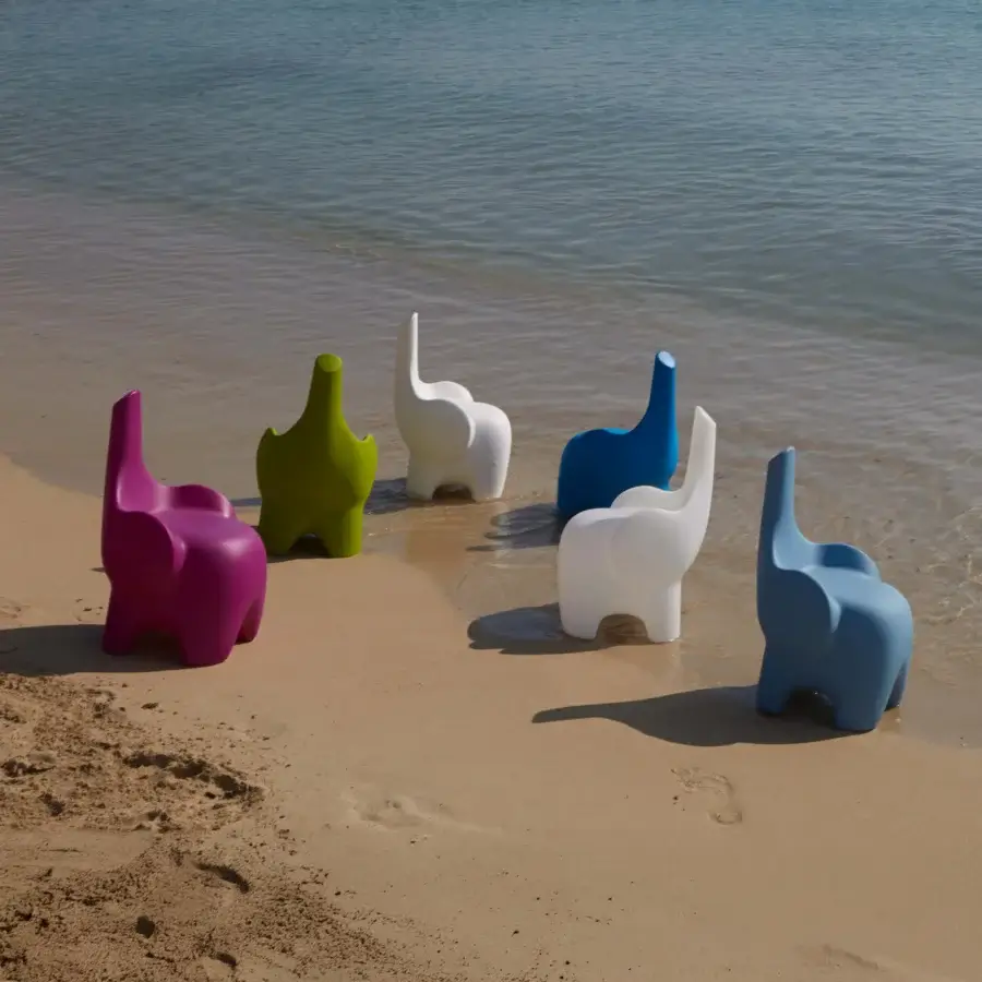 Superior MY YOUR Tino chair evoking a charming elephant form in magenta Poleasy® plastic with a glossy finish