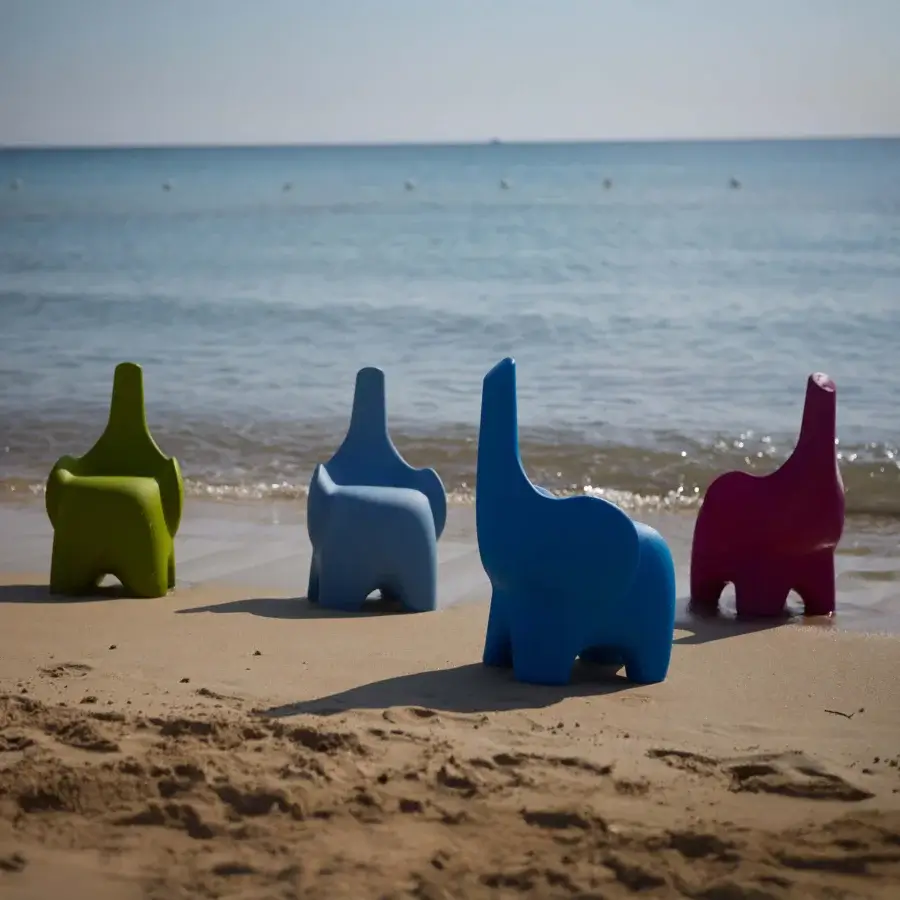 Distinguished MY YOUR Tino chair evoking an elephant design with durable Poleasy plastic and vibrant magenta finish