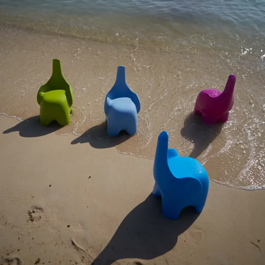 Exceptional MY YOUR Tino chair evoking an elephant form with glossy Poleasy plastic and charming ear-shaped backrests