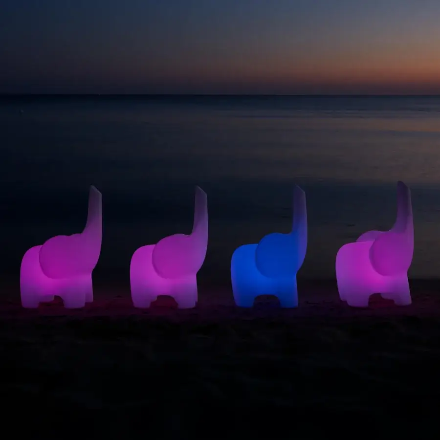 Distinguished MY YOUR Tino chair molded from bright blue Poleasy® with an upward-facing trunk serving as a backrest