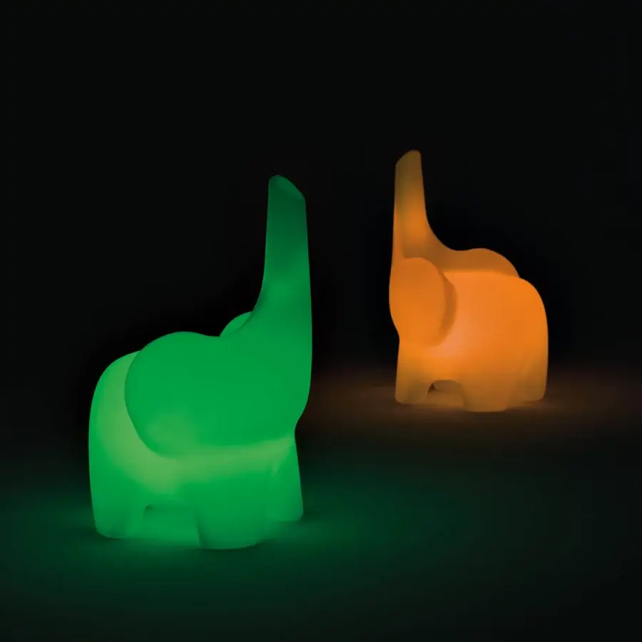 Distinctive MY YOUR Tino chair inspired by an elephant with glossy green Poleasy® material crafted in Italy