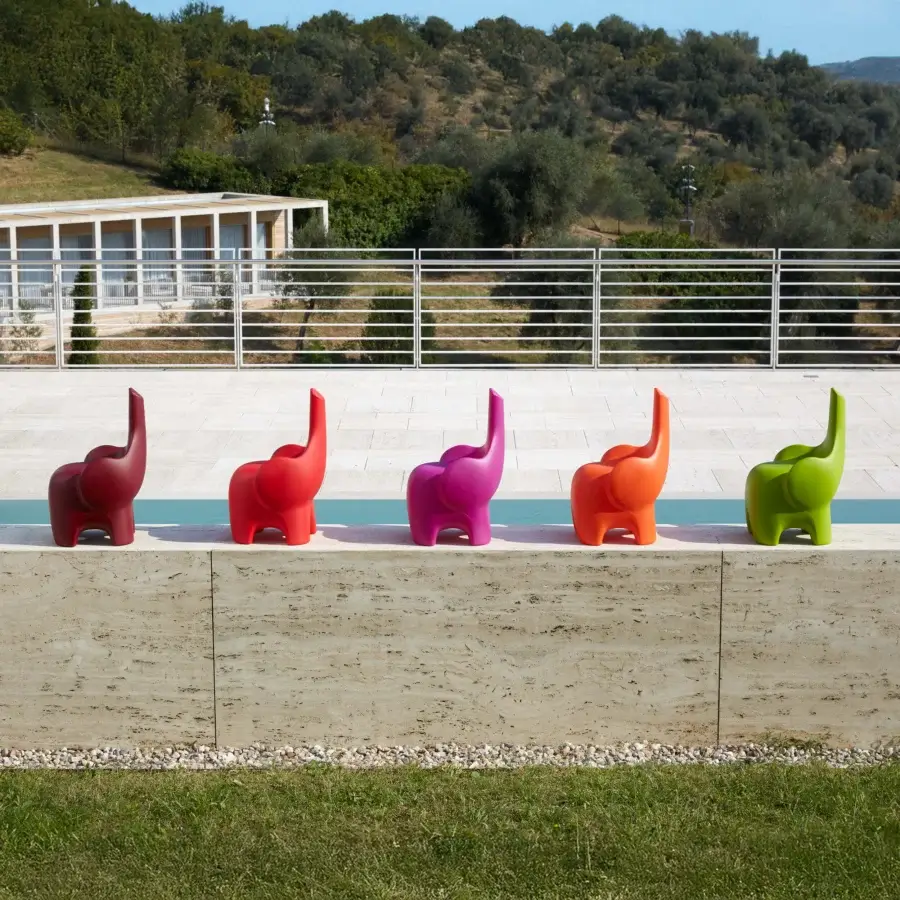 Captivating MY YOUR Tino chair shaped like an elephant with vibrant lime green Poleasy® and glossy finish