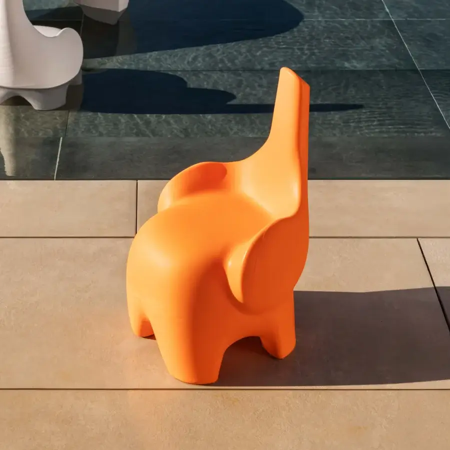 Captivating MY YOUR Tino chair sculpted like an elephant from durable Poleasy plastic with a smooth matte finish