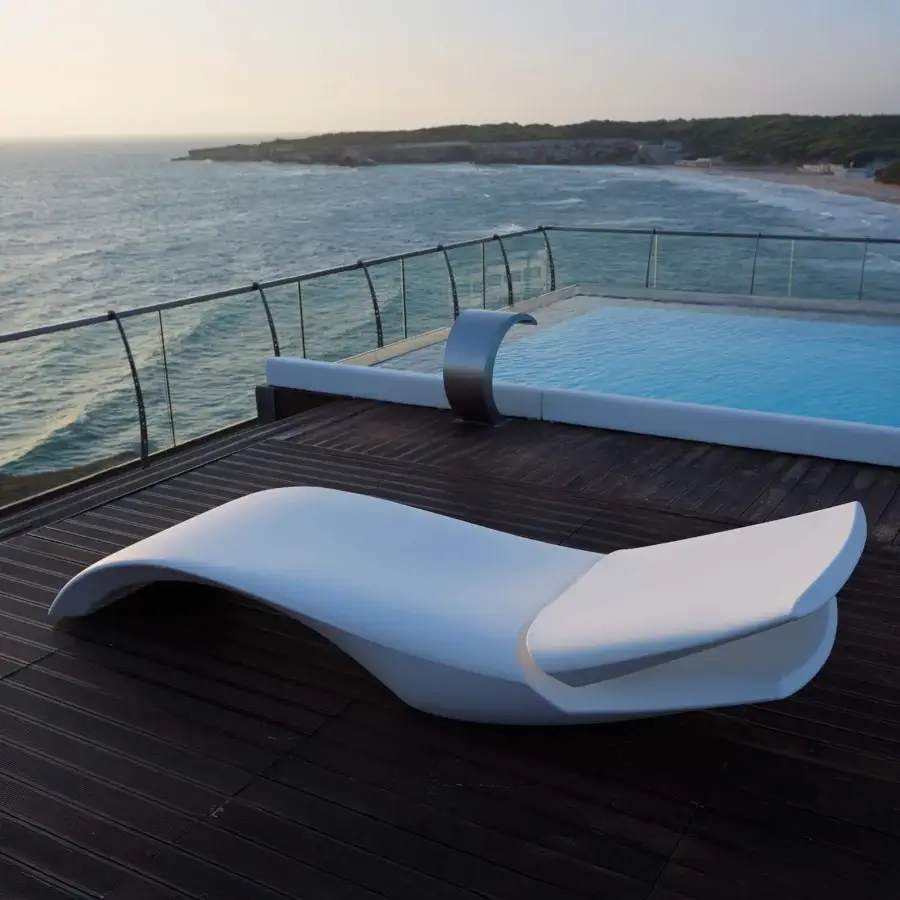 Exceptional MY YOUR Zoe Lounger, a sleek lounger crafted in white with a durable Poleasy® shell and fully chromed metal components