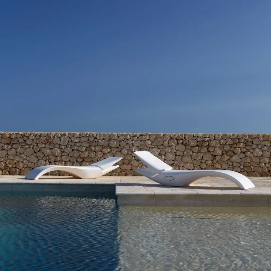 Elegant MY YOUR Zoe Lounger, a white Italian lounger crafted with durable Poleasy® shell and fully chromed metal devices with a glossy finish