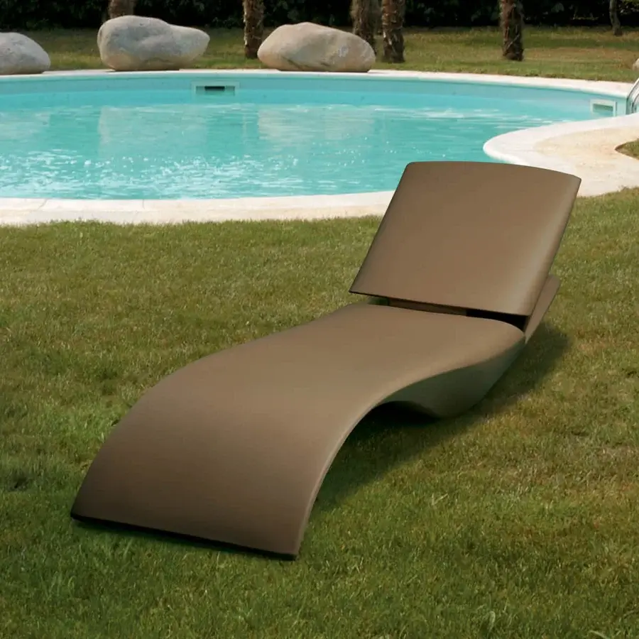Exceptional MY YOUR Zoe Lounger, a comfortable Italian lounger crafted with a matte medium brown Poleasy® shell and included headrest cushion