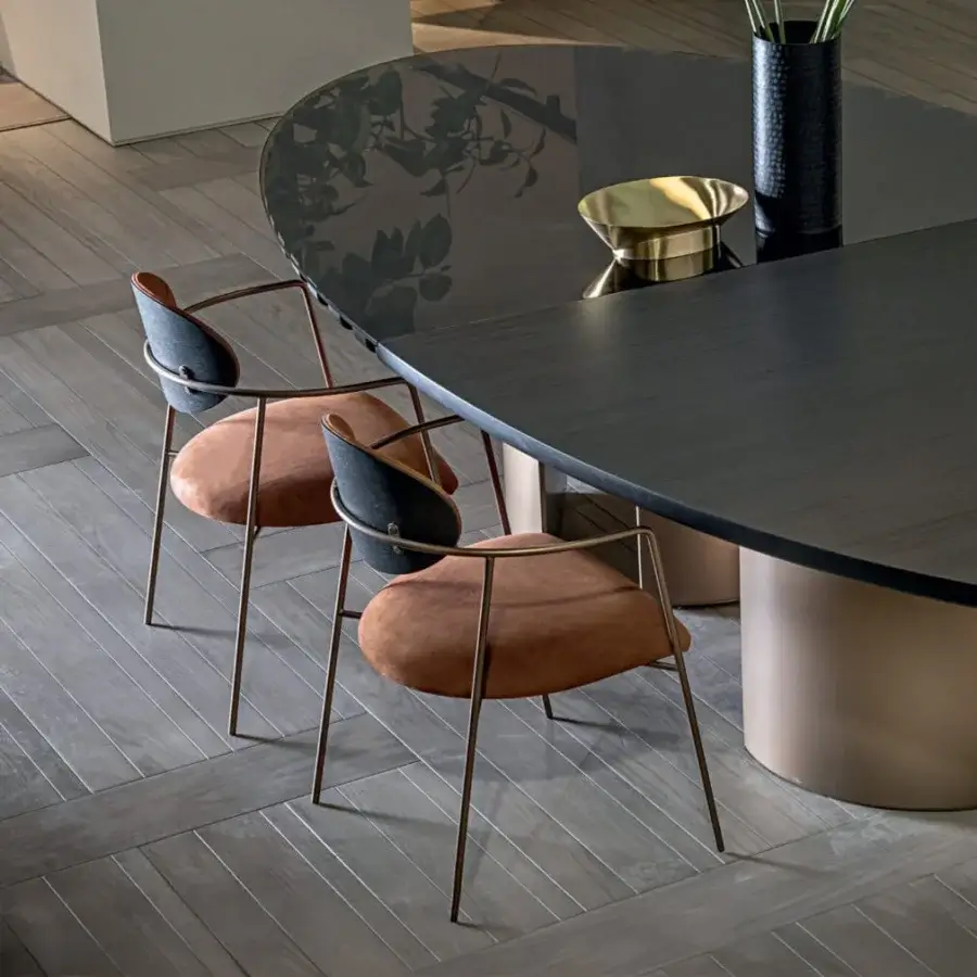 Distinguished Shake Eden armchair with reddish-brown acrylic fibre upholstery and varnished steel frame construction