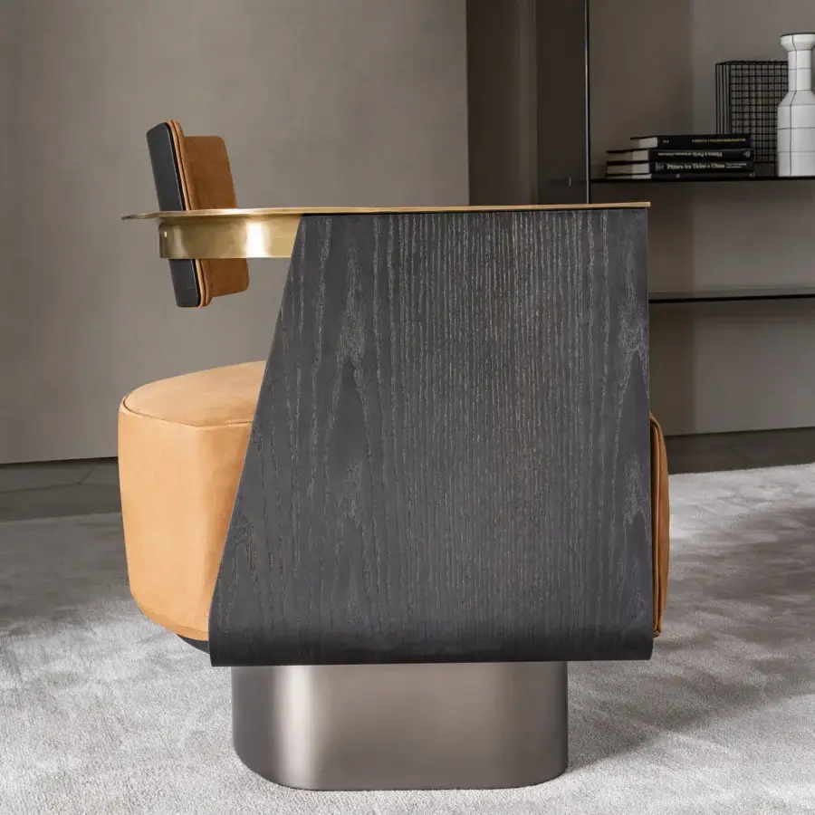 Distinguished Shake Boston lounge chair crafted with curved ash block board wood and burnished brass armrests in tan textile upholstery with matte finish