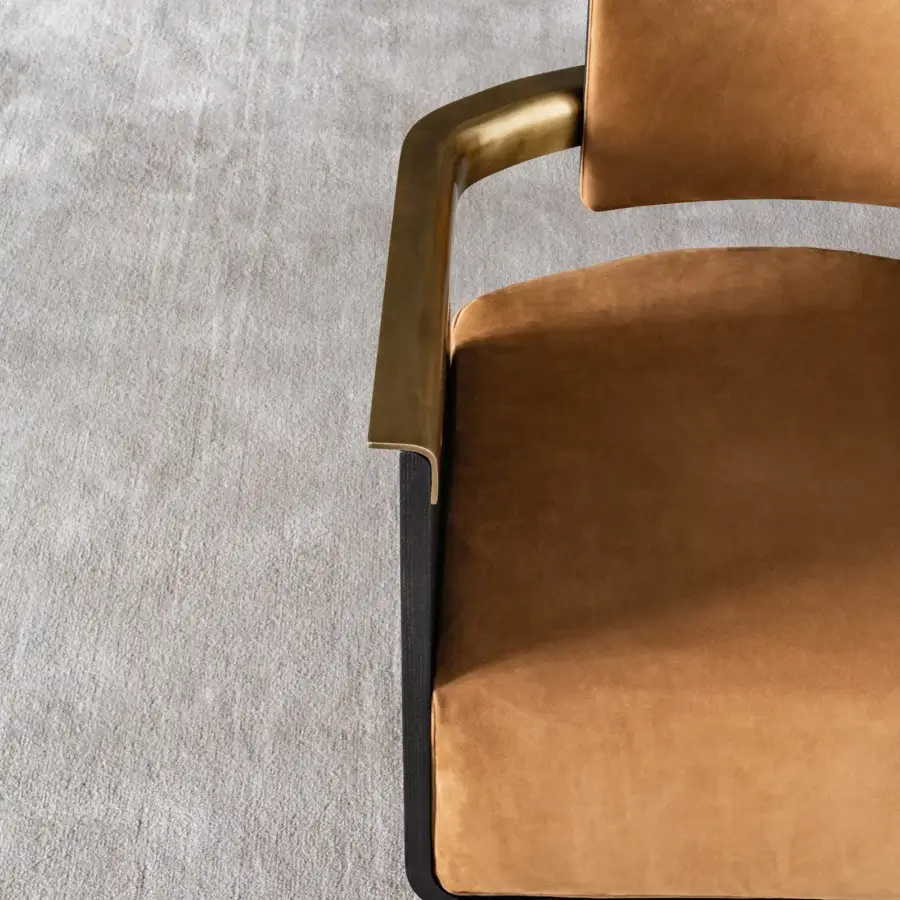 Lavish Shake Boston lounge chair with curved ash block board wood, burnished brass armrests and golden-brown textured fabric upholstery