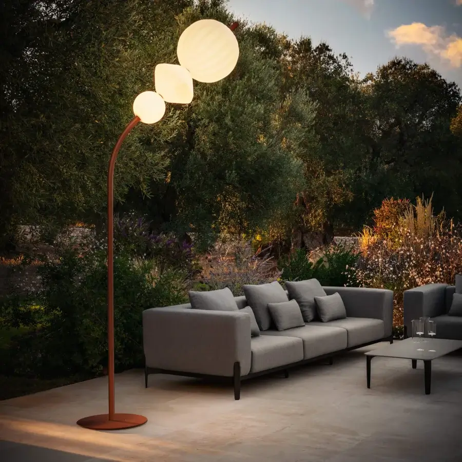 Elegant Lanzavecchia-Wai Joy floor lamp crafted with a copper-finish metal stem and marble base, displaying four translucent textured lampshades