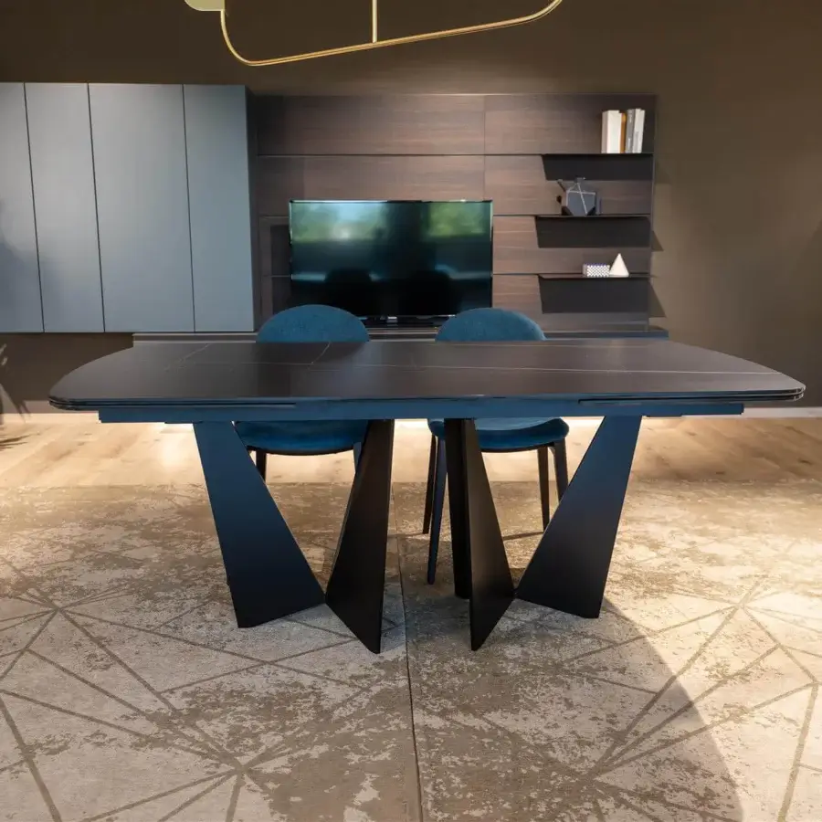 Superior Dallagnese Eiffel Shaped table crafted in wood with a matte dark gray-brown finish exhibiting a concealed extension system