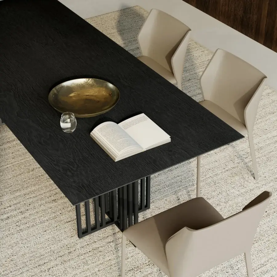 Distinguished Dallagnese Kiri table with dark gray wood tabletop and sculptural irregularly pitched metal base in matte finish
