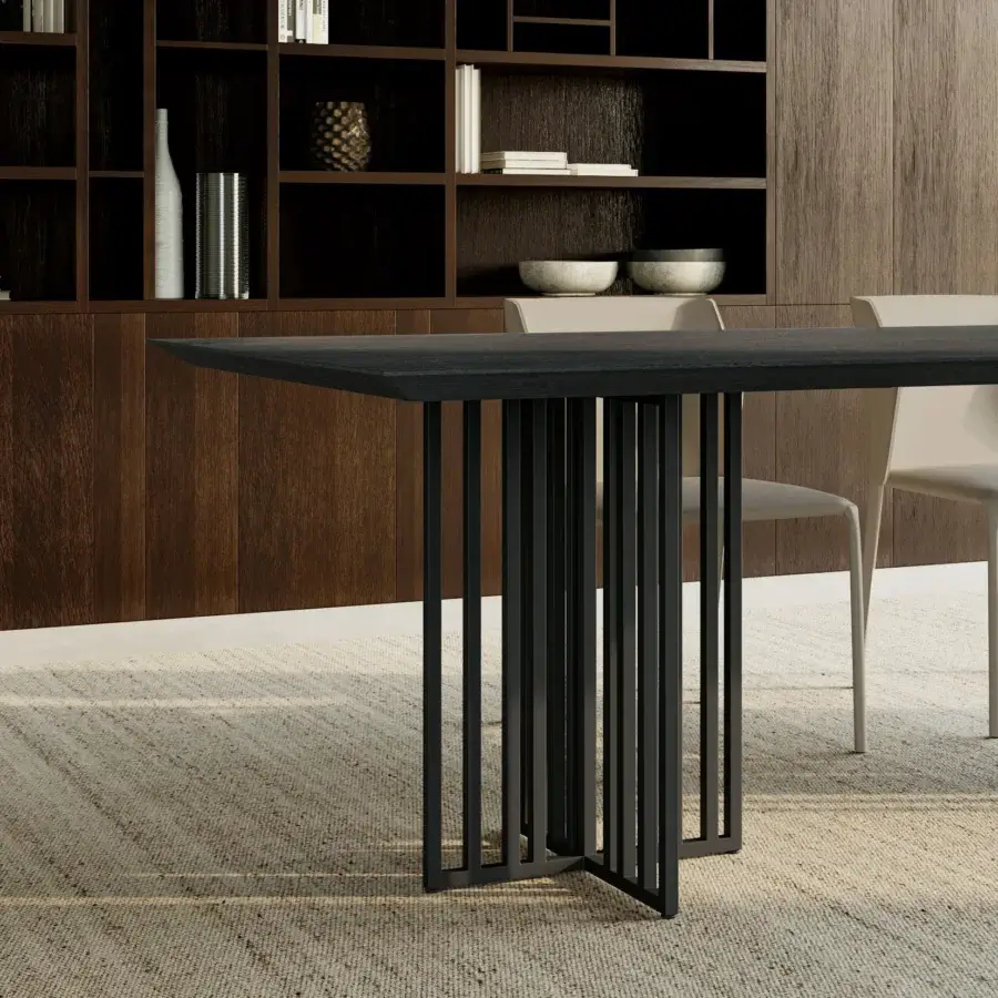 Architectural Dallagnese Kiri table with dark-finished wood tabletop and intersecting sculptural metal base in matte black