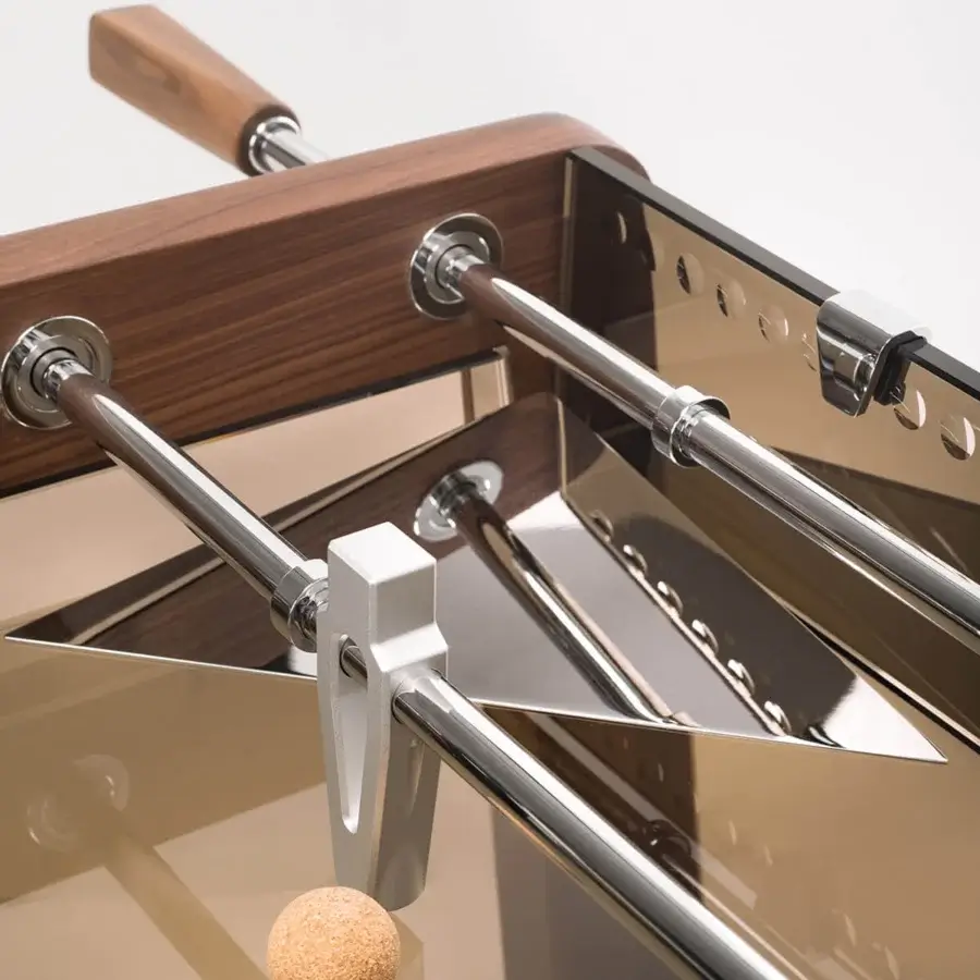 Elegant Impatia Derby wood foosball table crafted with polished silver rods and transparent glass in warm brown tones with a satin finish