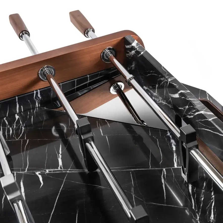 Distinguished Impatia Derby signature foosball built with walnut wood and Taj Black Quartzite in a satin finish