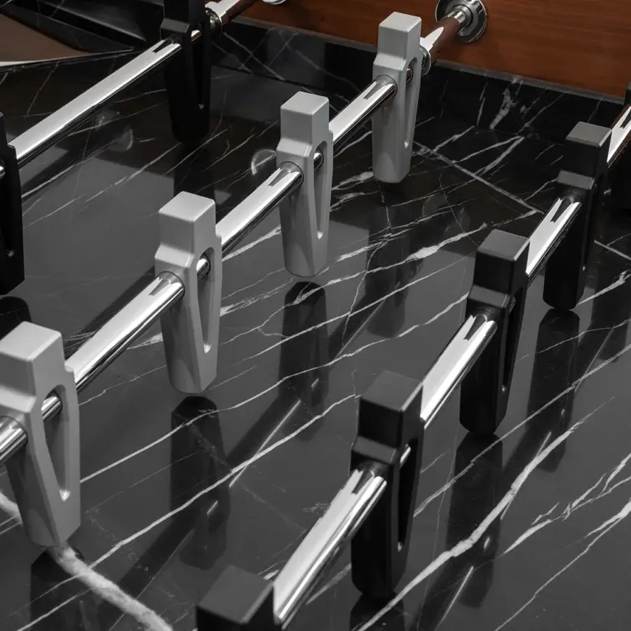 Superior Impatia Derby signature foosball built with walnut wood and Taj Black Quartzite playing surface with polished metal accents