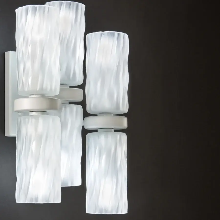 Captivating Euroluce Iceberg wall lamp crafted in translucent white glass with a light-toned metallic backplate and handcrafted cortex finish